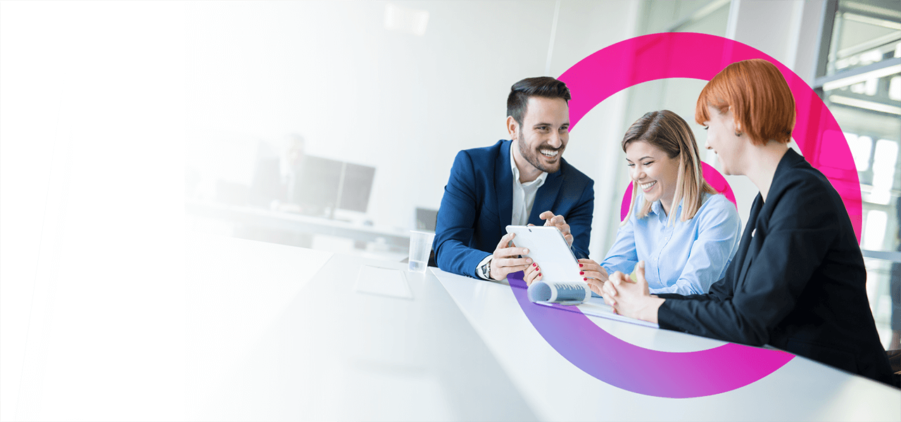 3 people in a meeting at an office. Smiling and looking at iPad. pink and purple gradient Cora lens to right of photo.