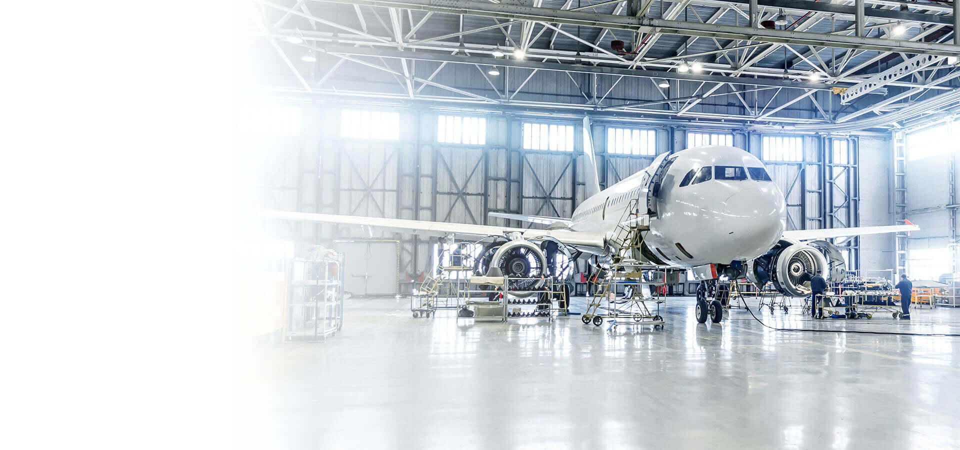 Aerospace & Defense Projects An image of an Aeroplane in a hanger
