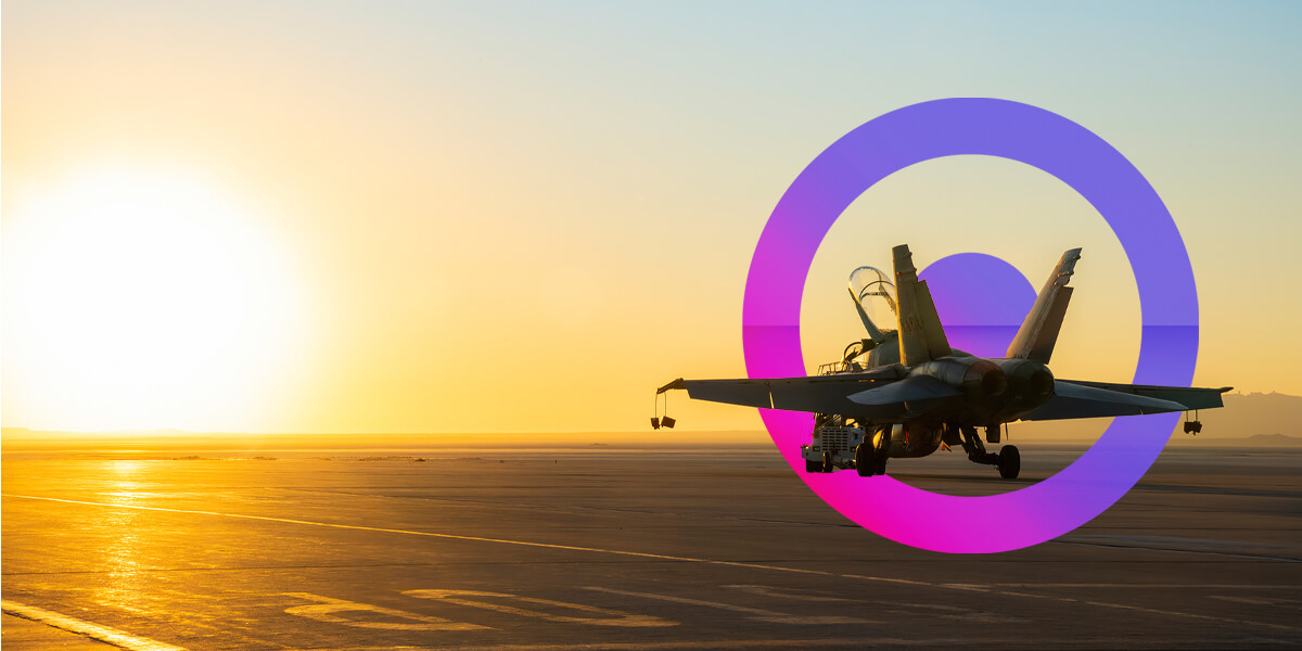 Jet plane on a runway during sunset. A pink and purple lens icon in the background.