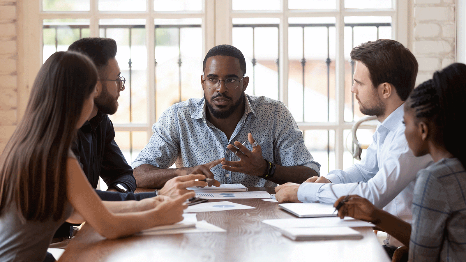 Team meeting in an office change management 