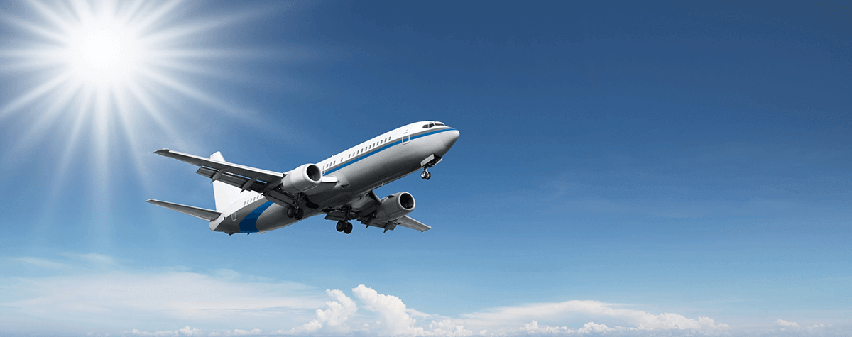 White Aircraft flying in the sky